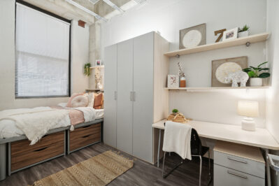 Furnished bedroom with work space