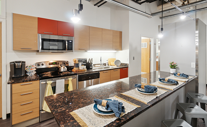 Furnished kitchen with a breakfast bar